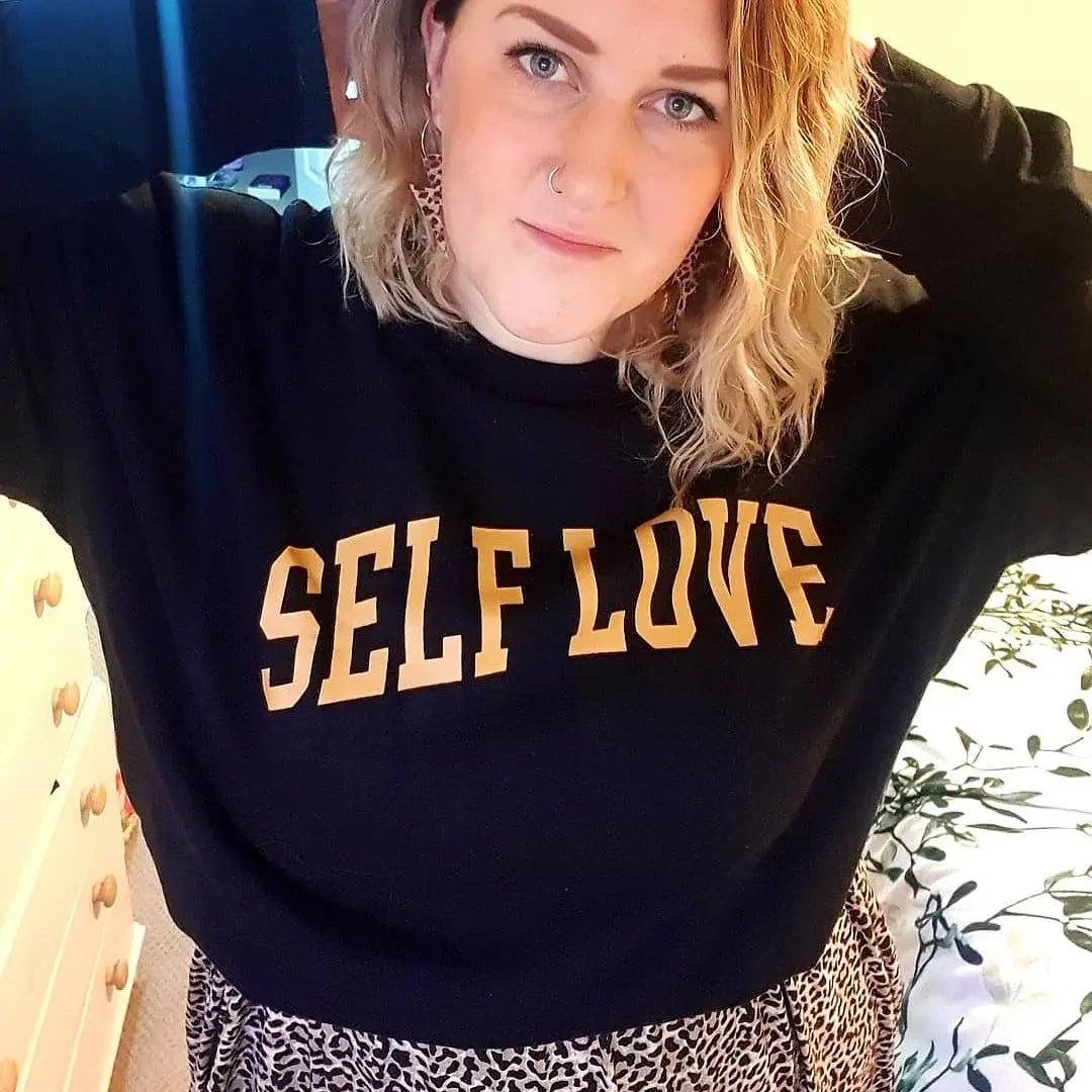 Gold and cheetah lightning bolt earrings