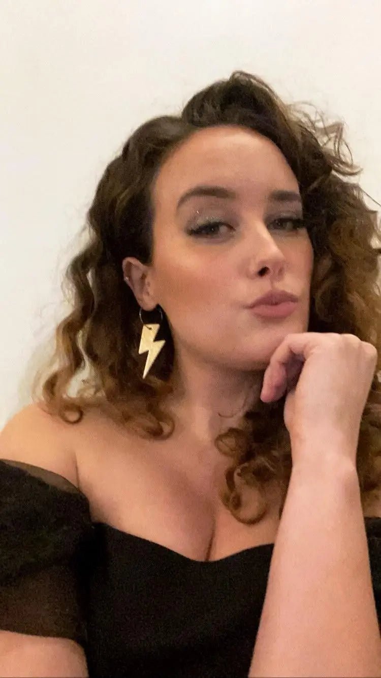 Gold and cheetah lightning bolt earrings