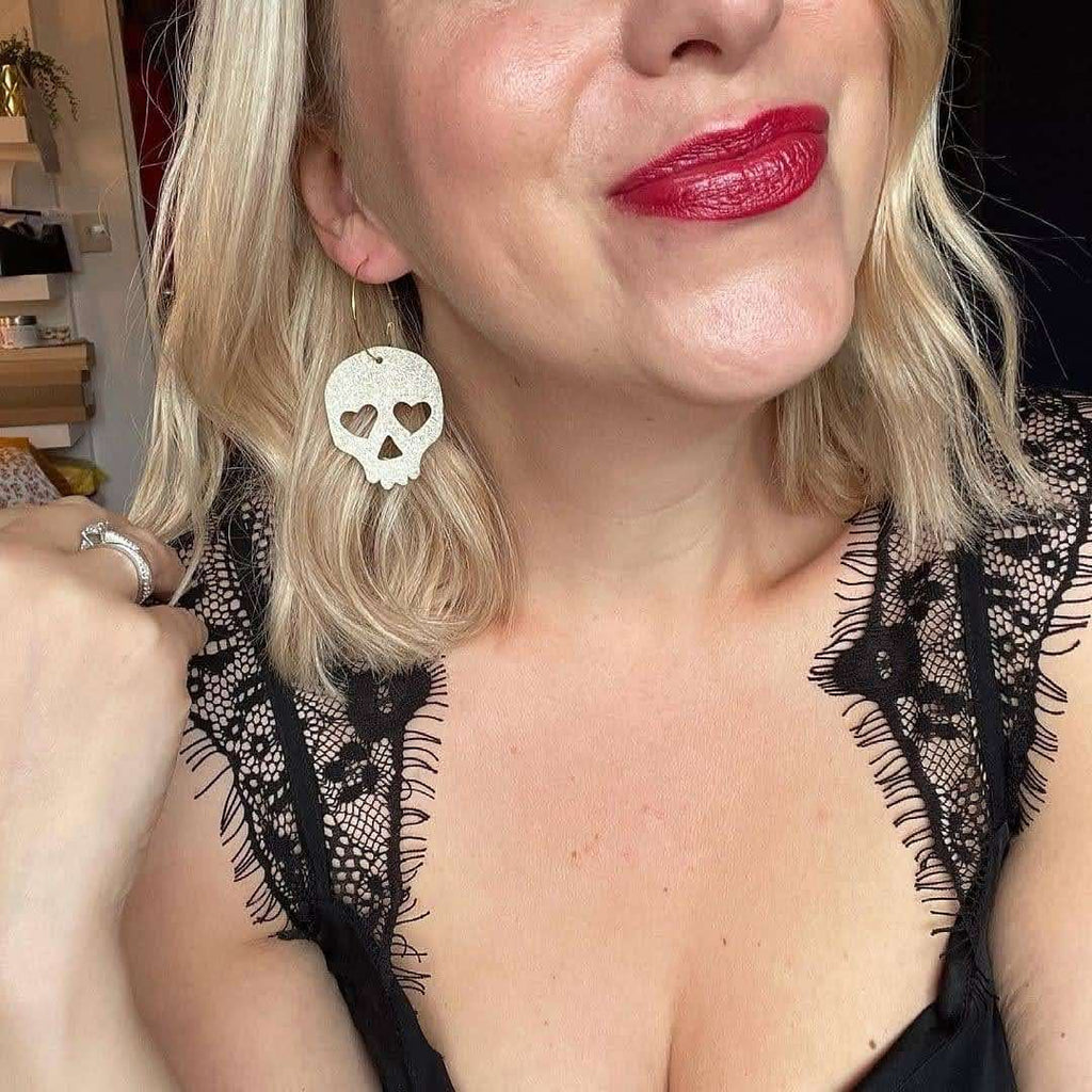 Gold or silver skull earrings