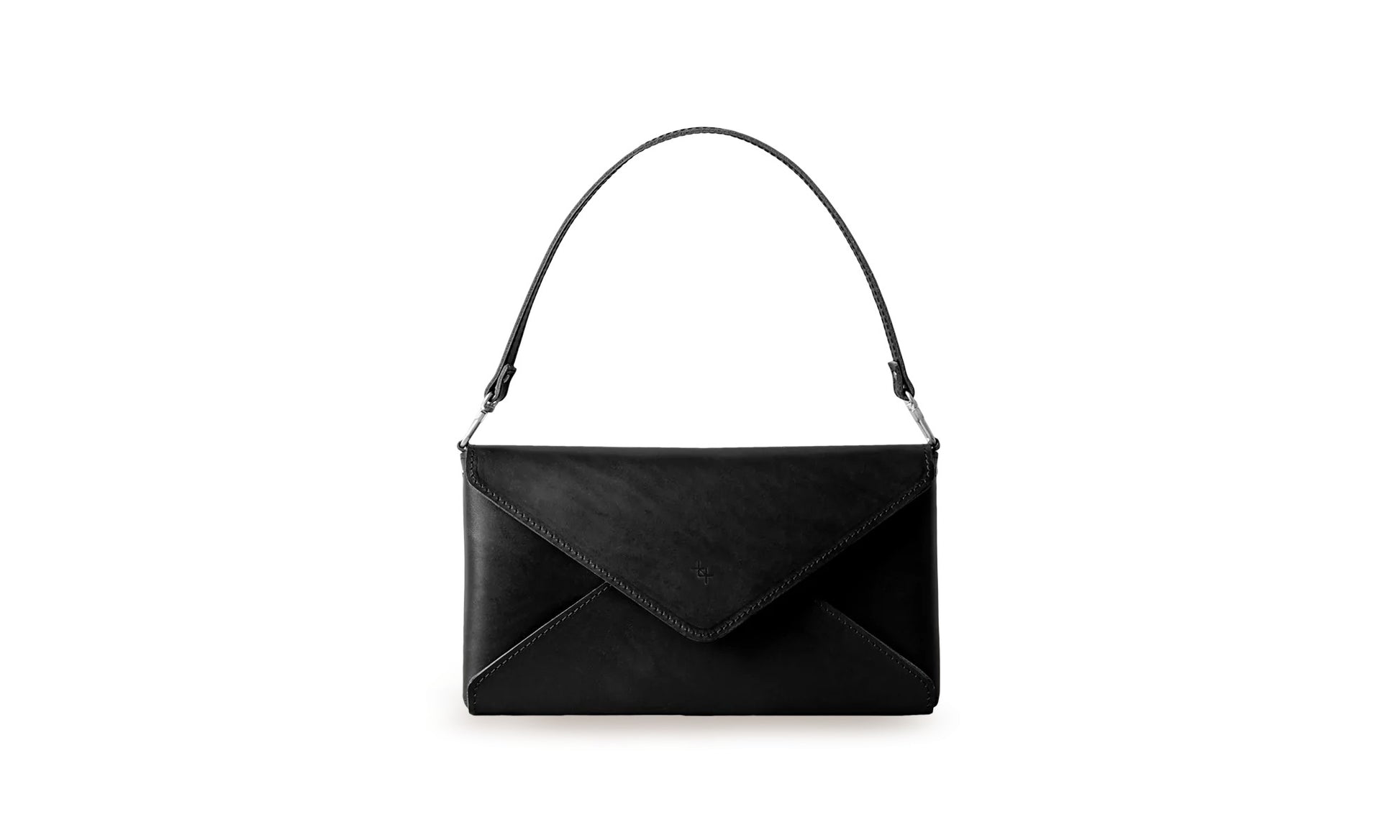 Embrace Timeless Elegance with the Great Model Clutch by Craftory at www.brixbailey.com