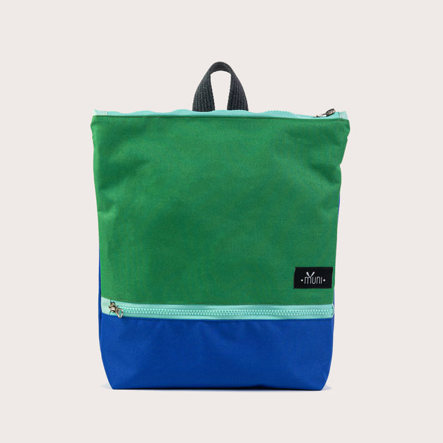 Green+Blue Waterproof Backpack – Stylish & Durable for Adventures by Muni at brixbailey.com