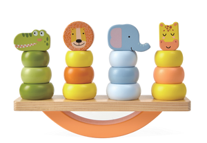 gentle morning light on a child's hands carefully balancing a wooden fox on a swing