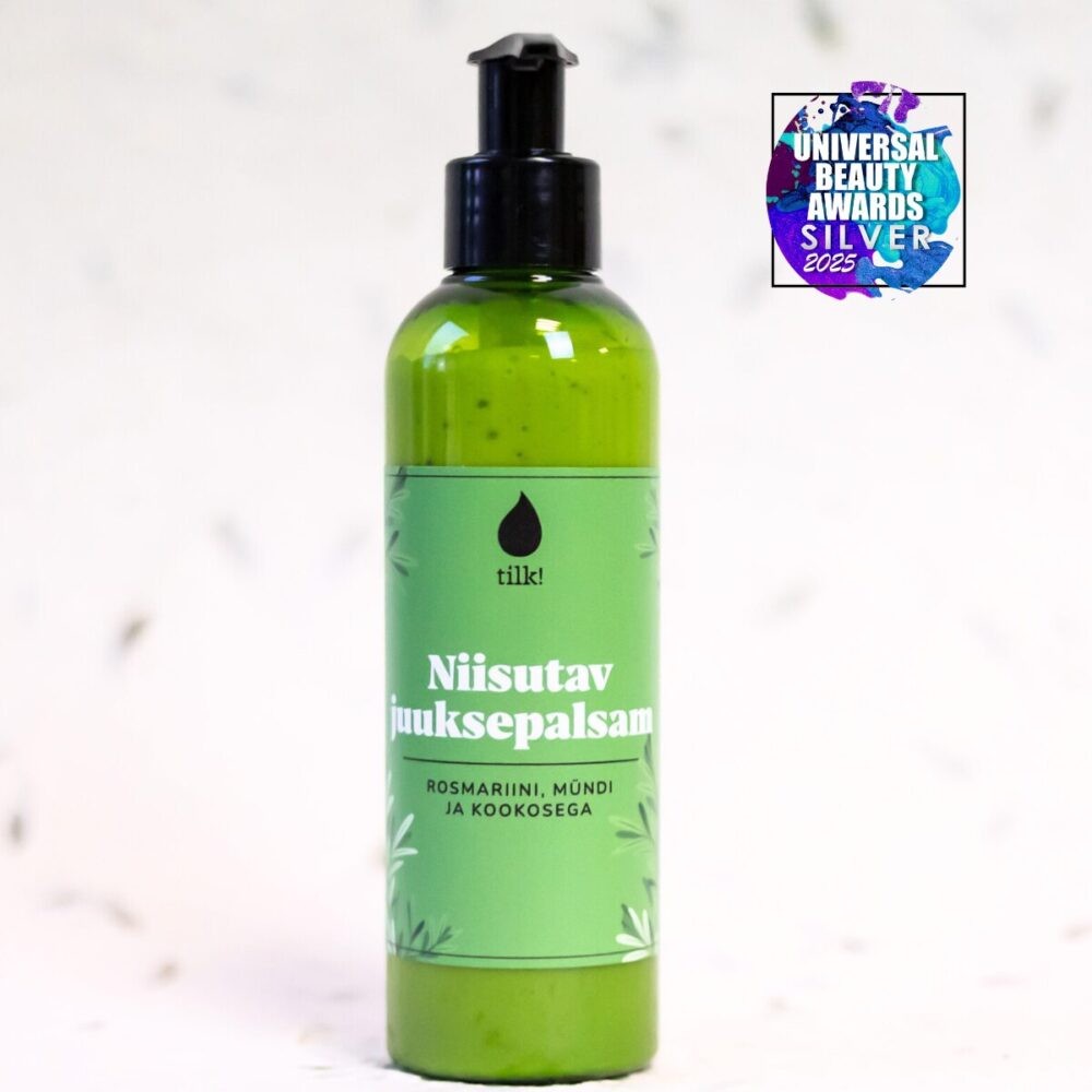 soft mint-green hair conditioner bottle with rosemary sprigs, resting on a wooden shelf in warm sunlight
