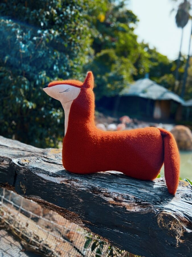 handmade fox pillow detail shot showing soft llama wool texture and stitching