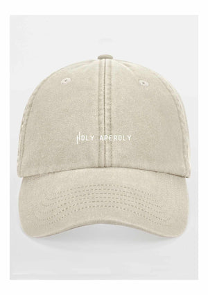 a soft pastel cotton cap with a vintage look, shown in gentle morning light