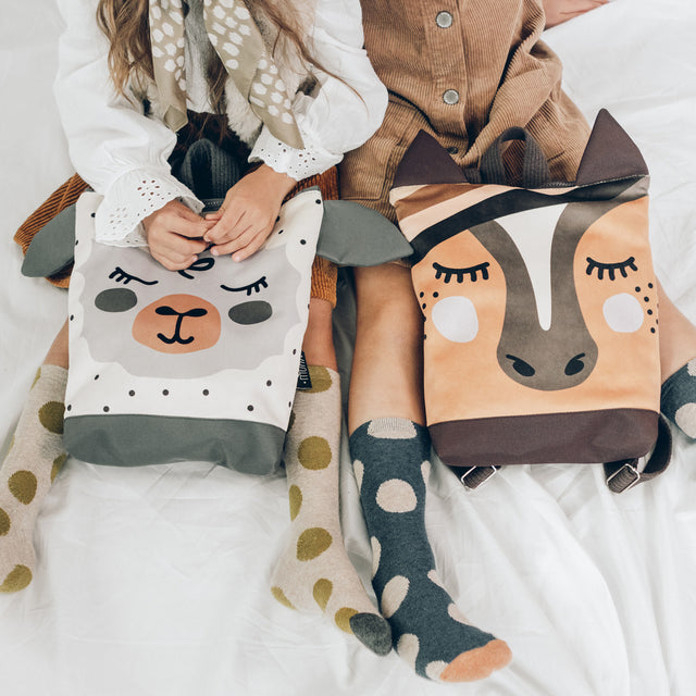 Sheep-Inspired Kids' Backpack – Fun & Functional Outdoor Gear by Muni at www.brixbailey.com