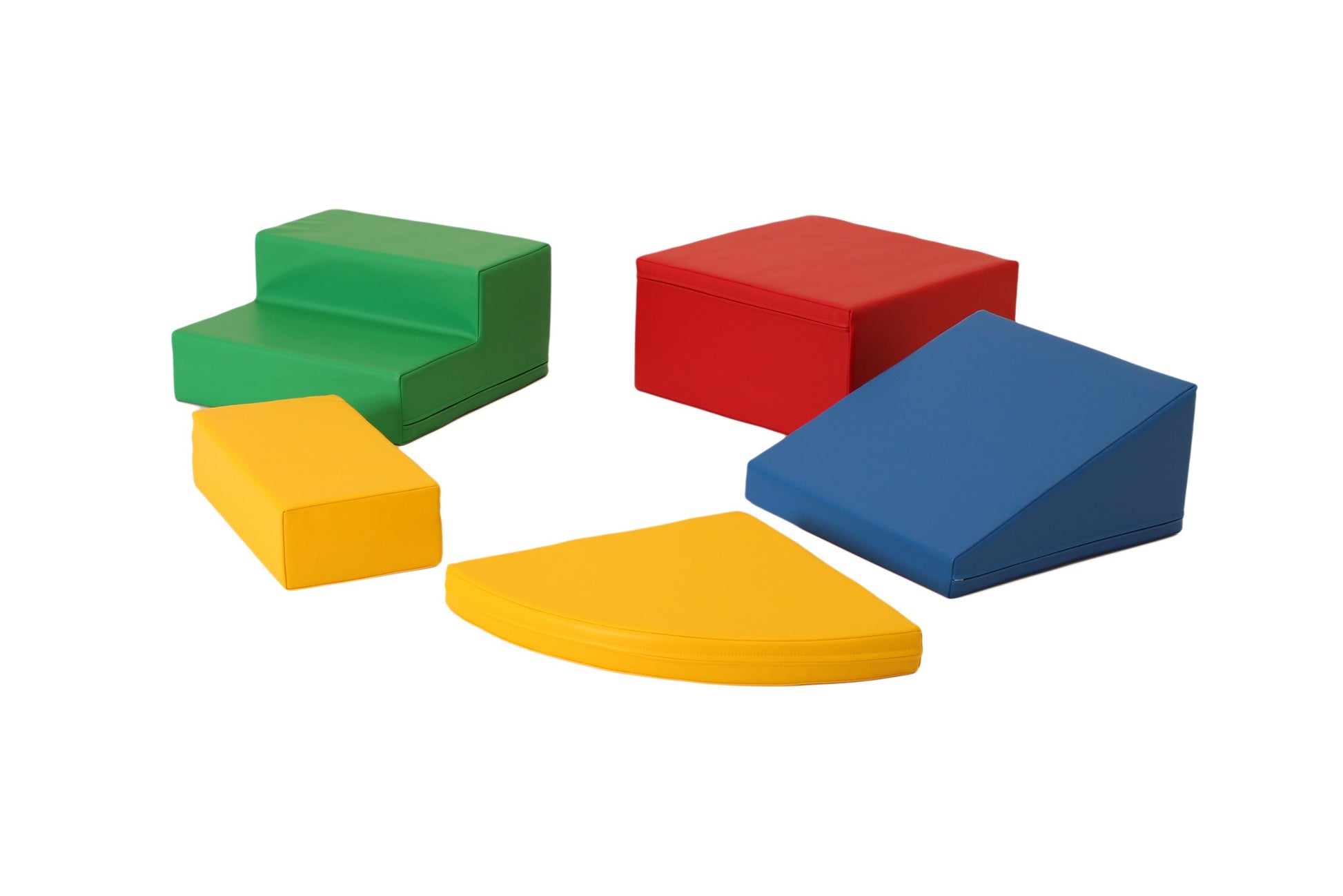 a toddler's hand reaching for the top of a vibrant multicolor iglu foam corner climber