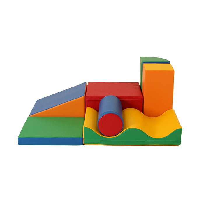 a toddler building a colorful iglu foam block fort in a sunlit playroom