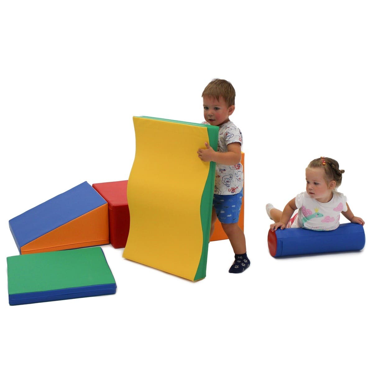 a child's hand reaching for a vibrant multicolor iglu foam block in soft morning light