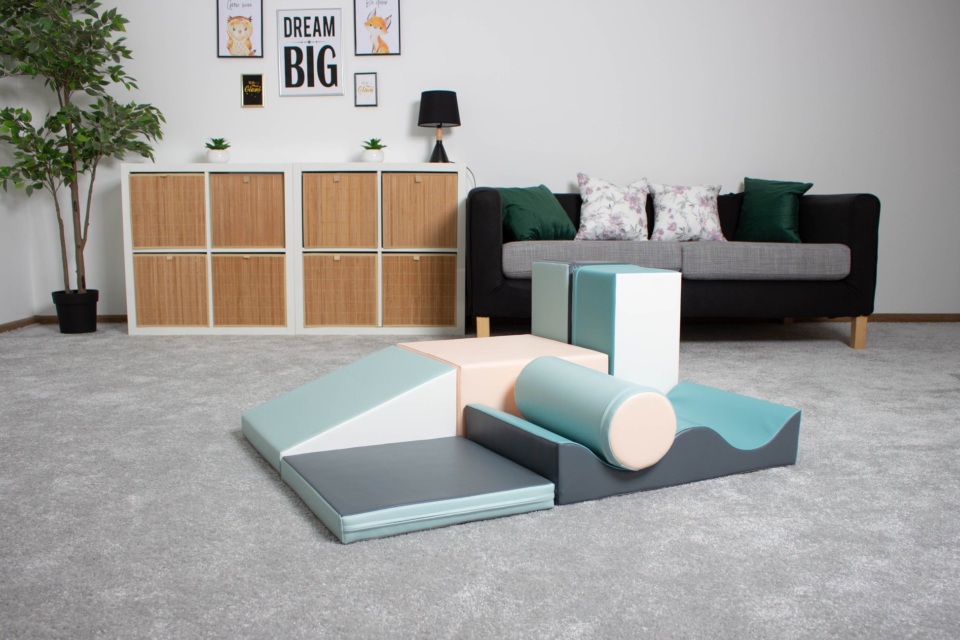 a soft pastel iglu discoverer block set arranged in a gentle, inviting stack for a nursery