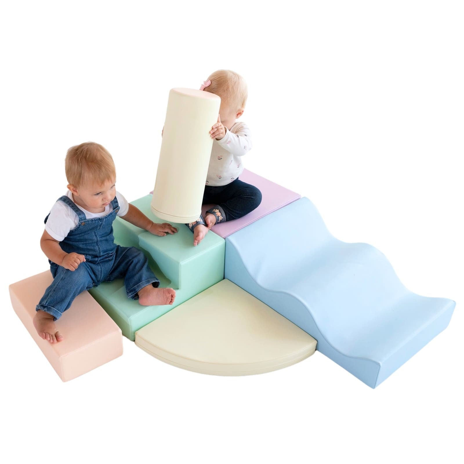 a toddler building a cozy pastel igloo fort with soft foam blocks