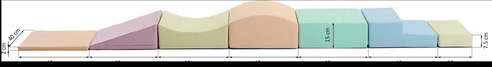 soft pastel foam blocks arranged in a creative tower for a toddler to climb