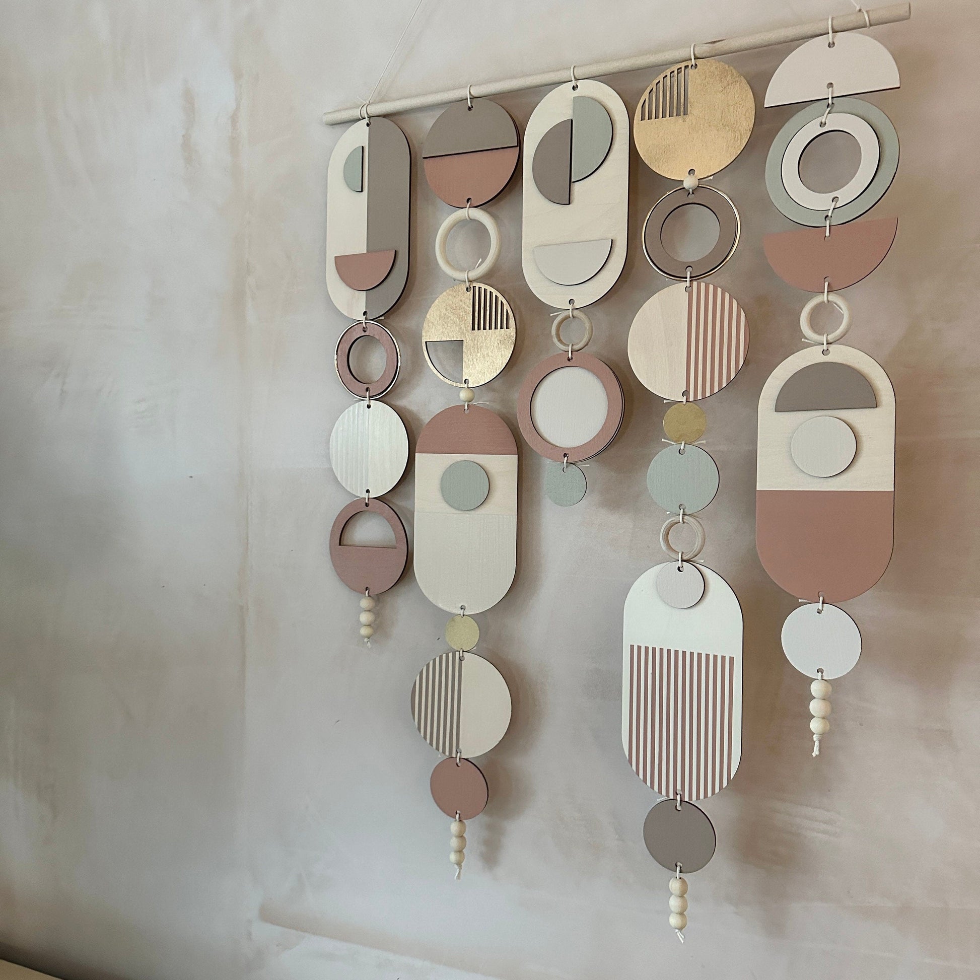 Modern Wall Art with Gold Metal Hoop Detailing and Blush Pink Accents