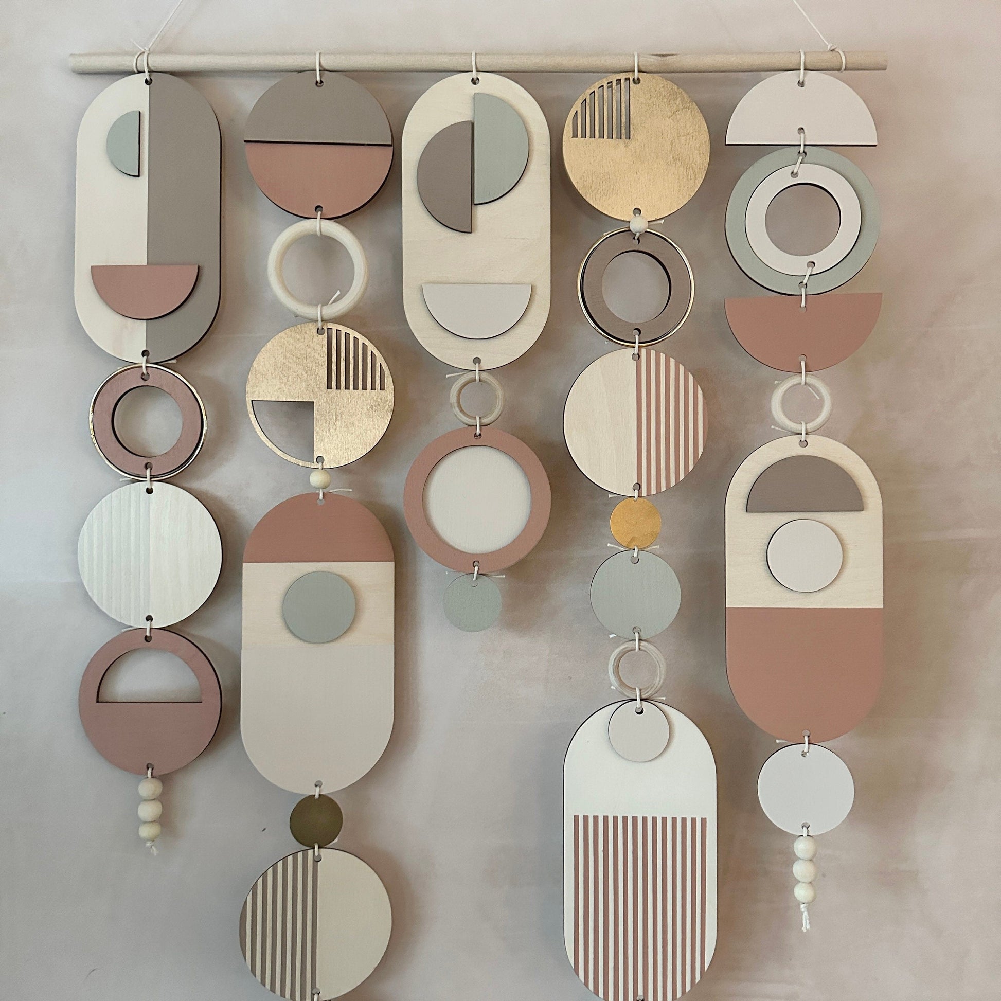 Modern Wall Art with Gold Metal Hoop Detailing and Blush Pink Accents
