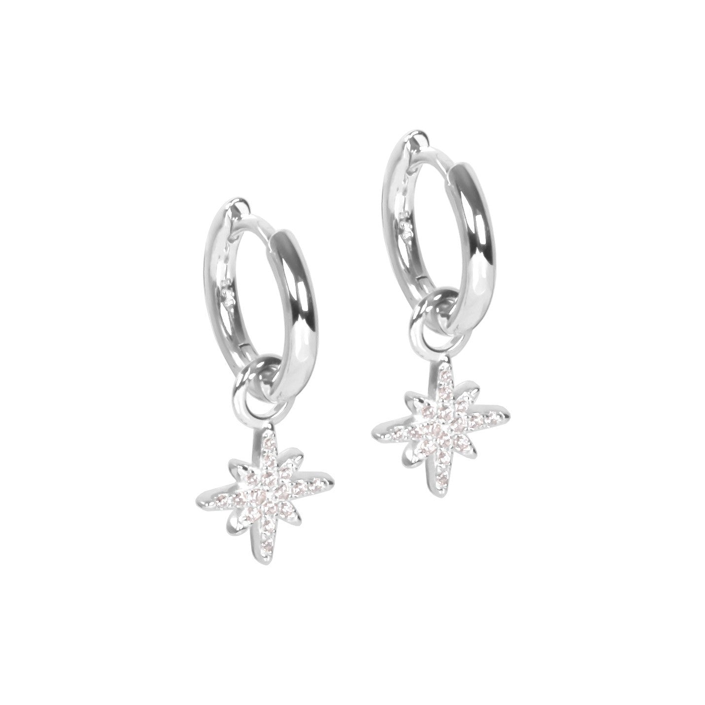 bold sterling silver star charm hoop earrings with a confident, close-up view on a dark background