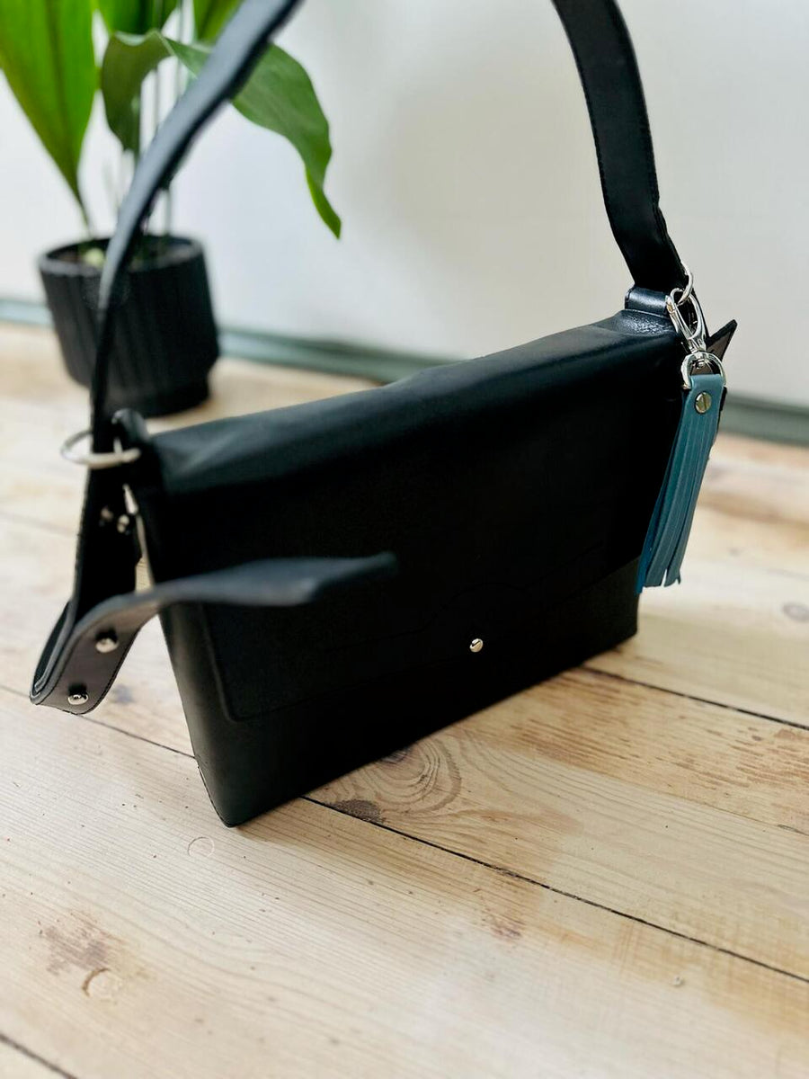 Versatile KOKUKA Black Bag – Stylish & Functional Leather Accessory by eleriinseim at www.brixbailey.com