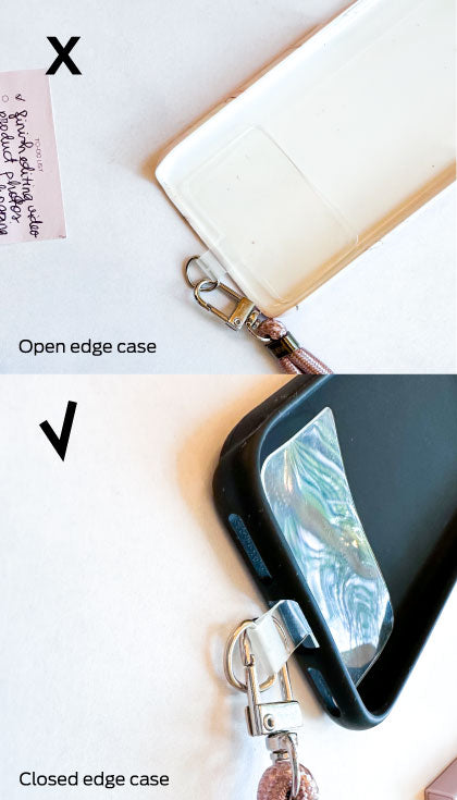 seik universal phone strap in midnight black attached to a phone case, shown from a practical side angle