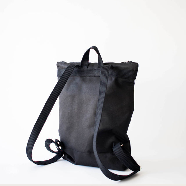 Chic Black Bow Backpack – Waterproof & Stylish for Everyday Use by Muni at brixbailey.com