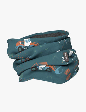a soft kids merino neck tube with a charming tractor print, shown in gentle morning light