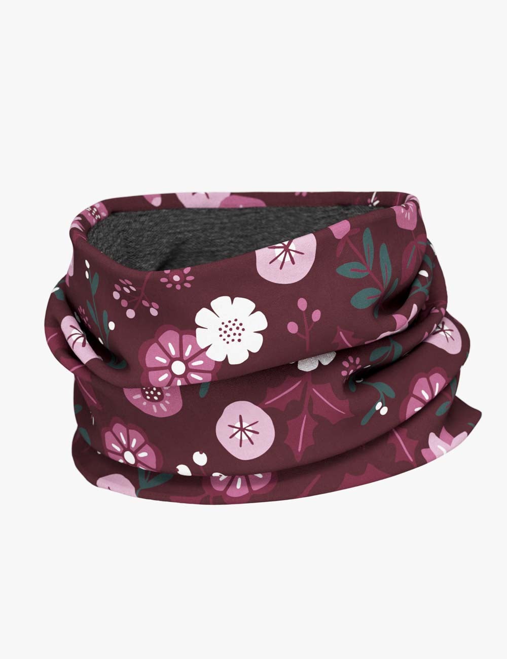 kids merino neck tube with winter flowers laid flat on a wooden bench to show its stretchy, practical fit