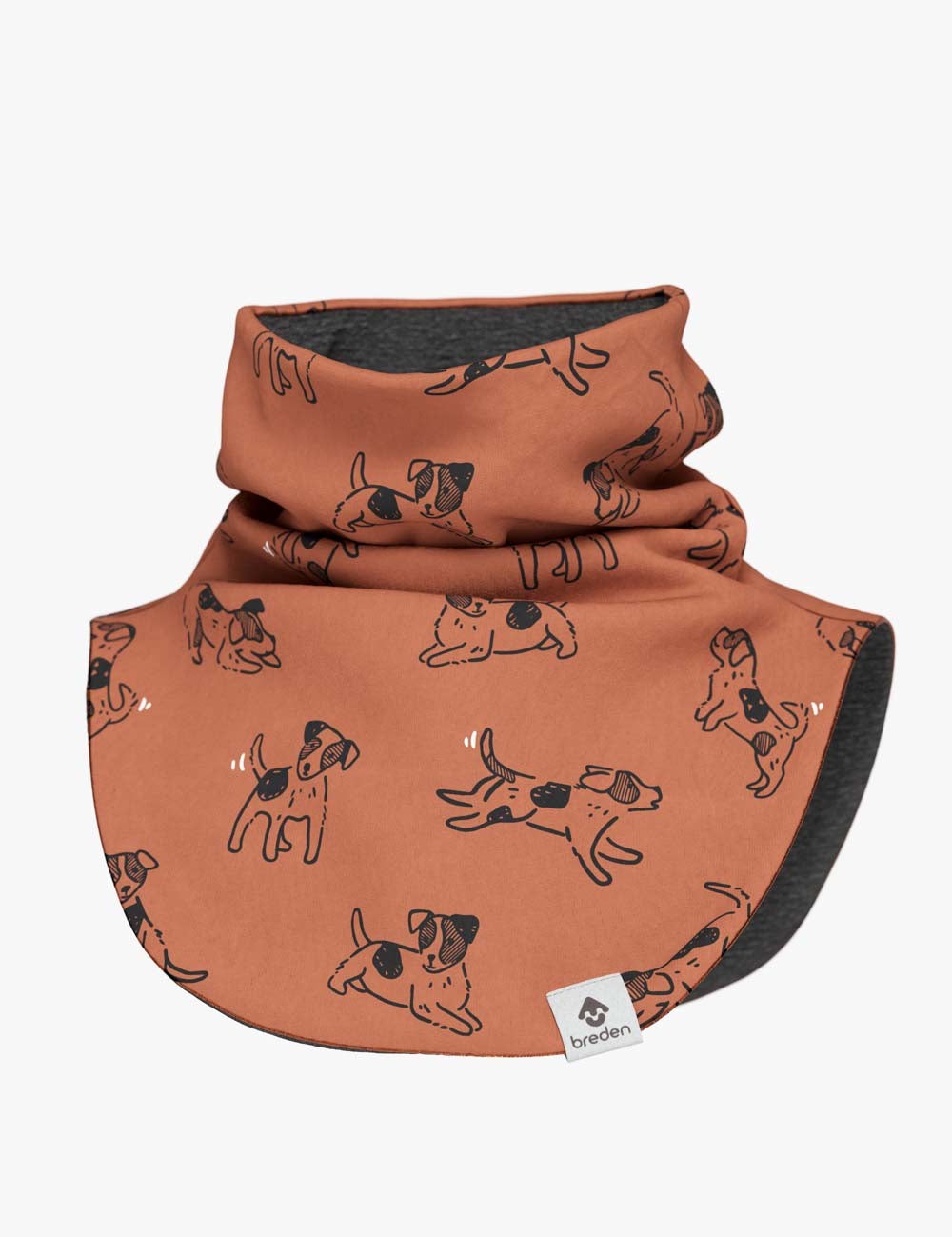 a child wrapped in a soft copper dogs merino neck warmer, bathed in gentle morning light