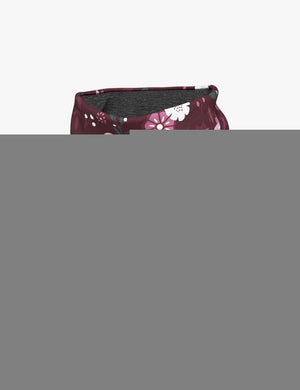 a soft kids merino neck warmer with a delicate winter flowers pattern, shown in gentle morning light