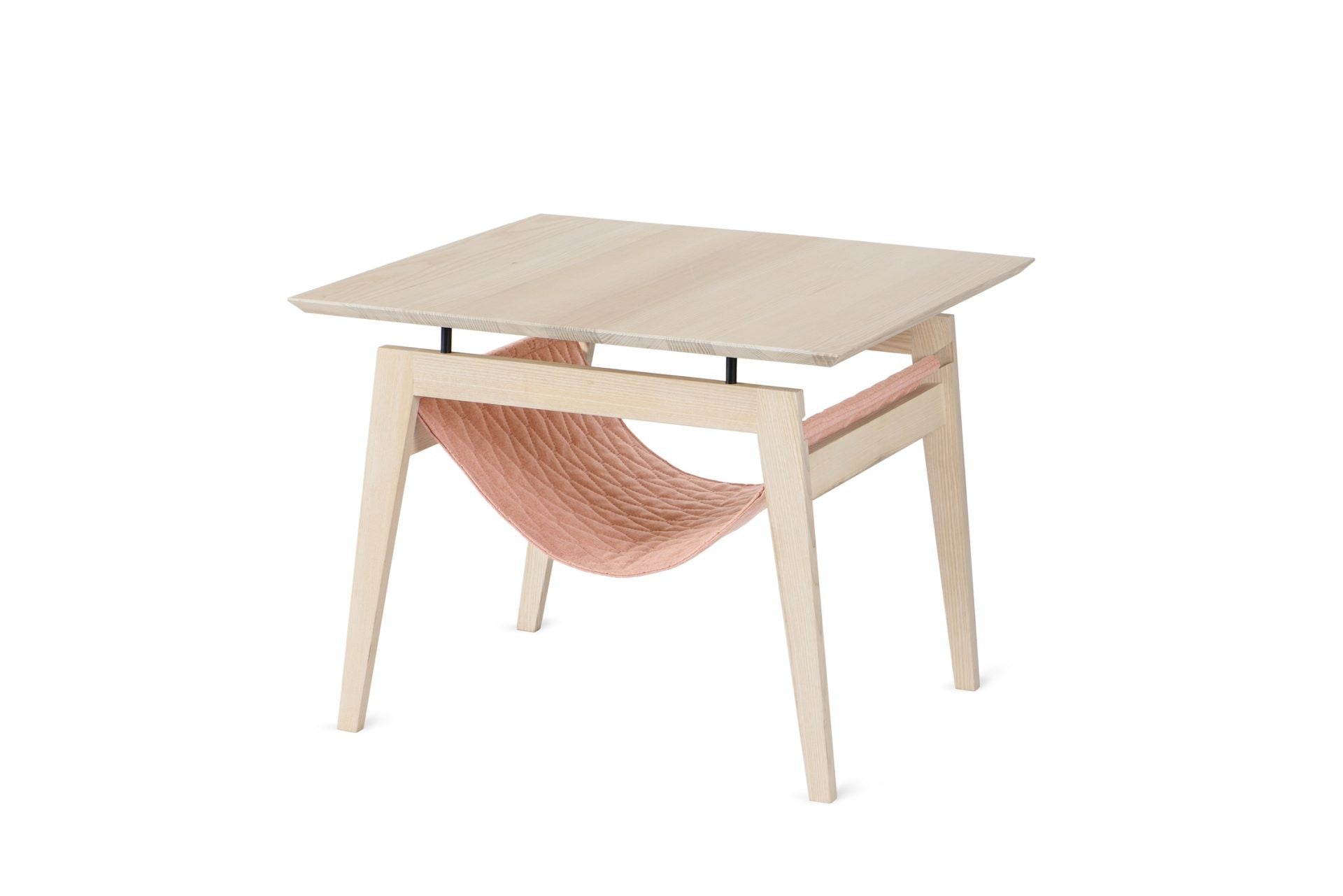 bold raspberry kikko table with a cat hammock in dramatic studio lighting