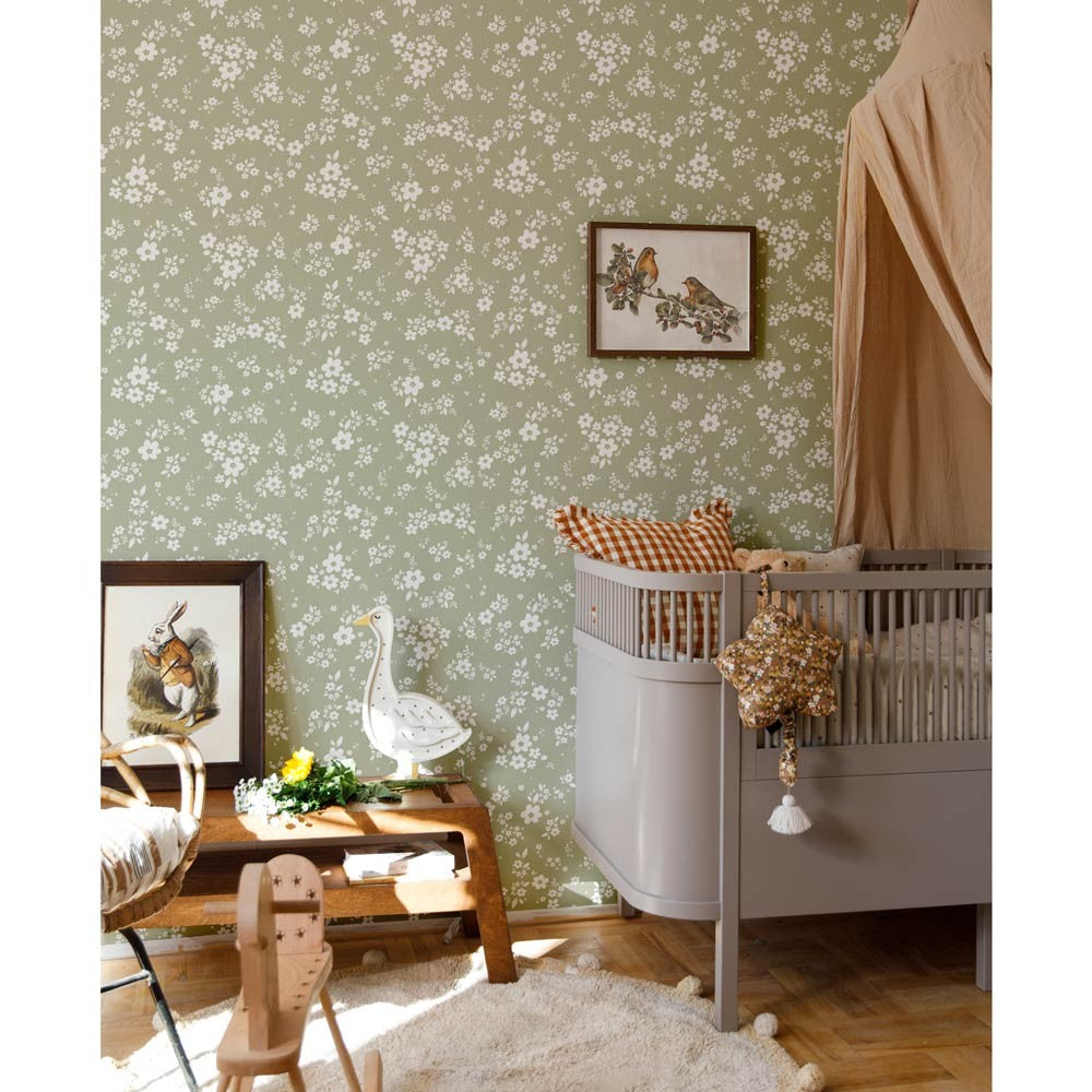 bold close-up of lace meadow green wallpaper showing its intricate pattern and rich color