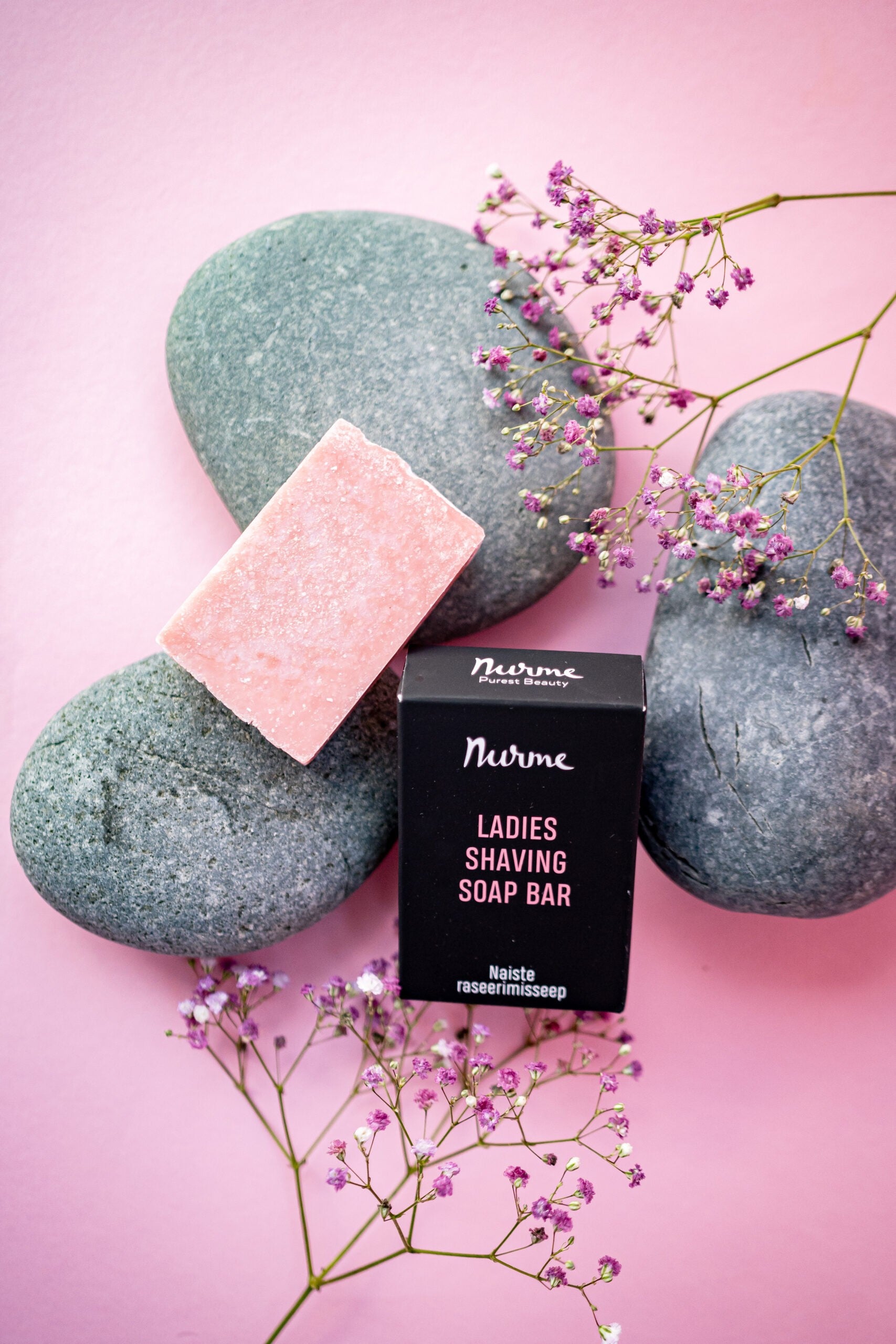 ladies vegan shaving soap bar with shea butter on a soft linen towel