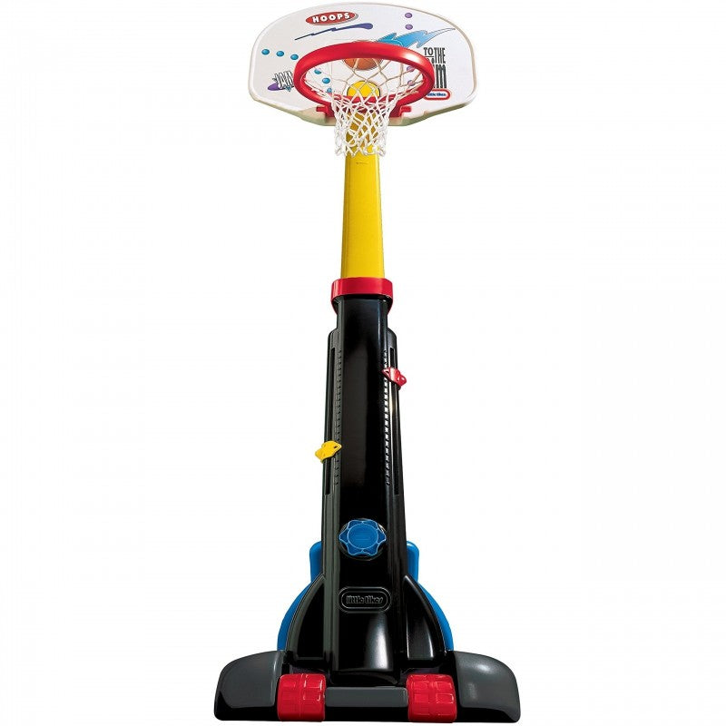 playful kids shooting hoops on a sunny day with the adjustable little tikes basketball set