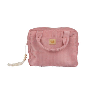 soft baby pink cotton makeup bag open on a cozy bed, showing its inner waterproof pocket and gentle handmade texture