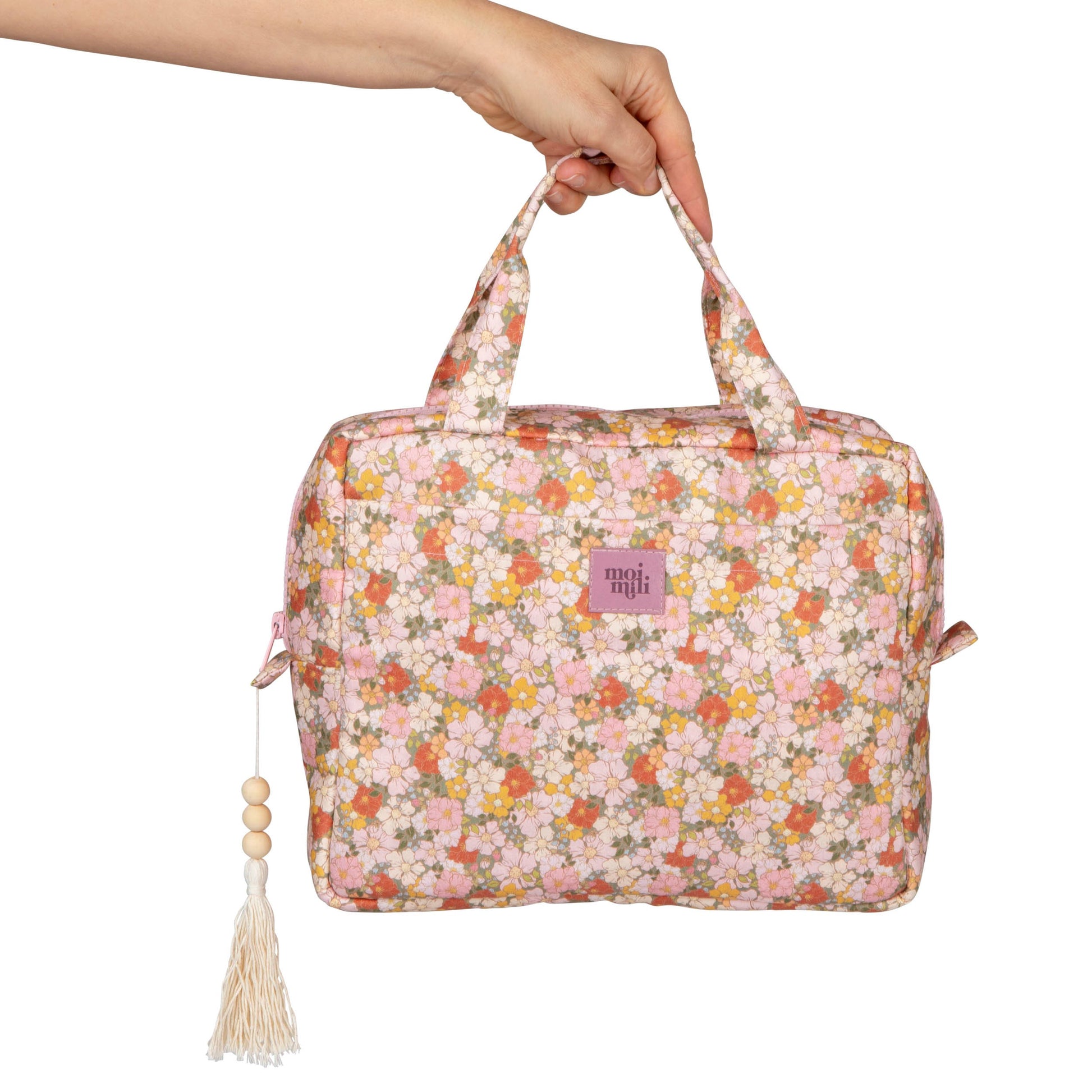 large green garden makeup bag with waterproof lining, open to show inner pockets, perfect for travel essentials