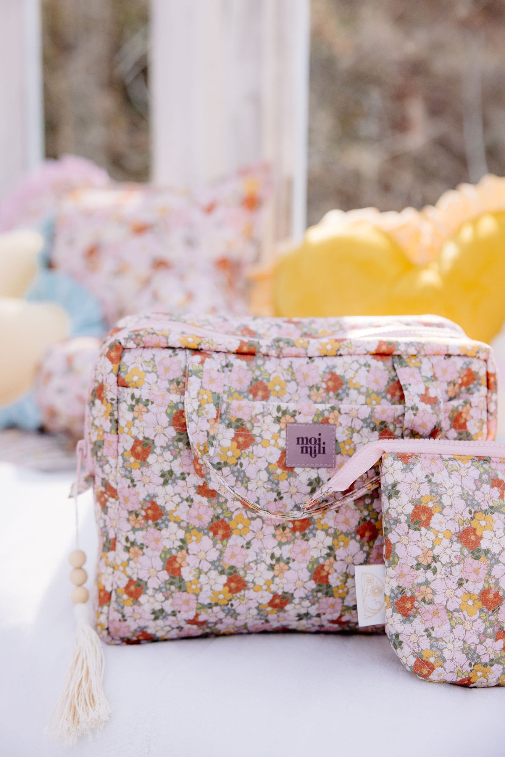 large green garden makeup bag with waterproof lining, open to show inner pockets, practical for travel