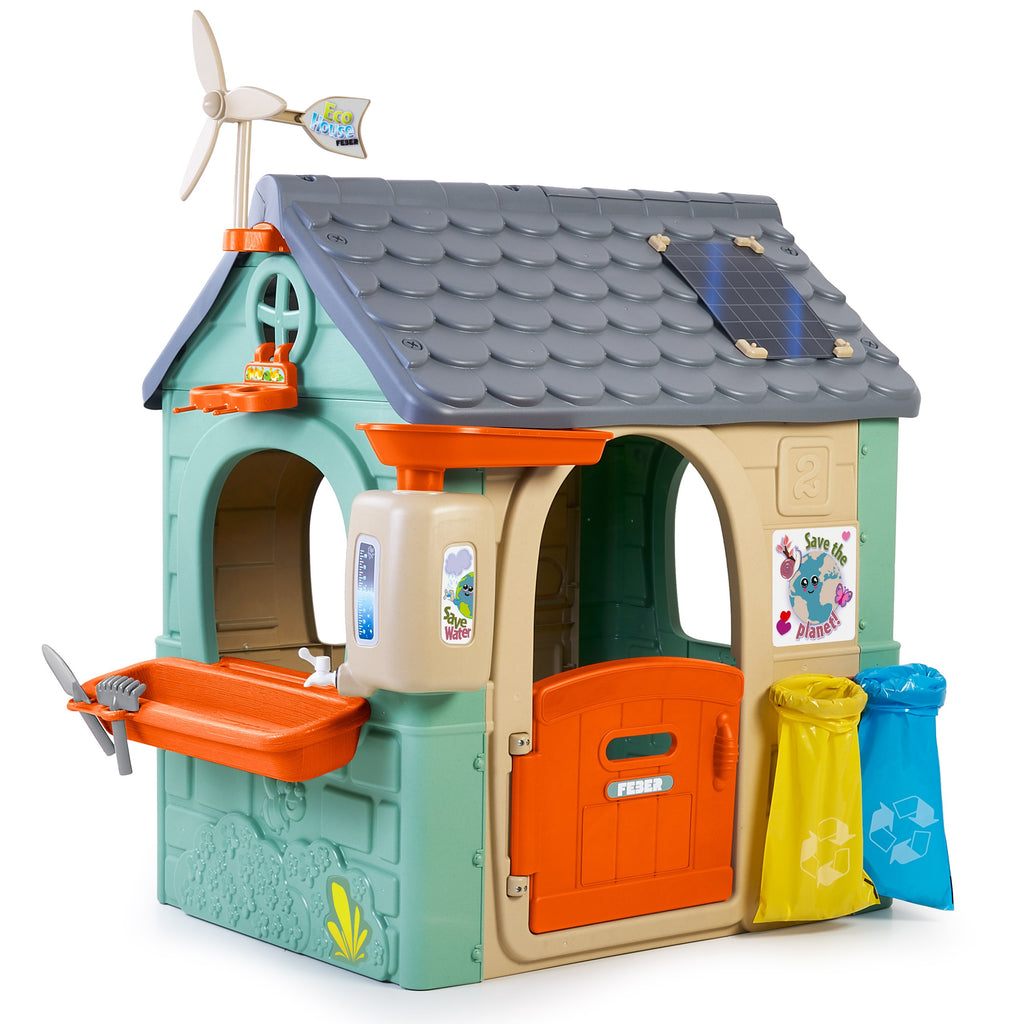 elegant recycled eco playhouse with wind turbine and solar panels, teaching kids sustainability through play