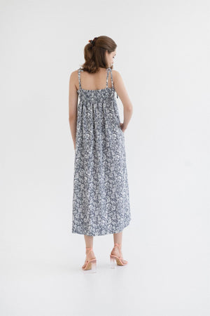 soft linen ballade dress with porcelain flowers in gentle morning light