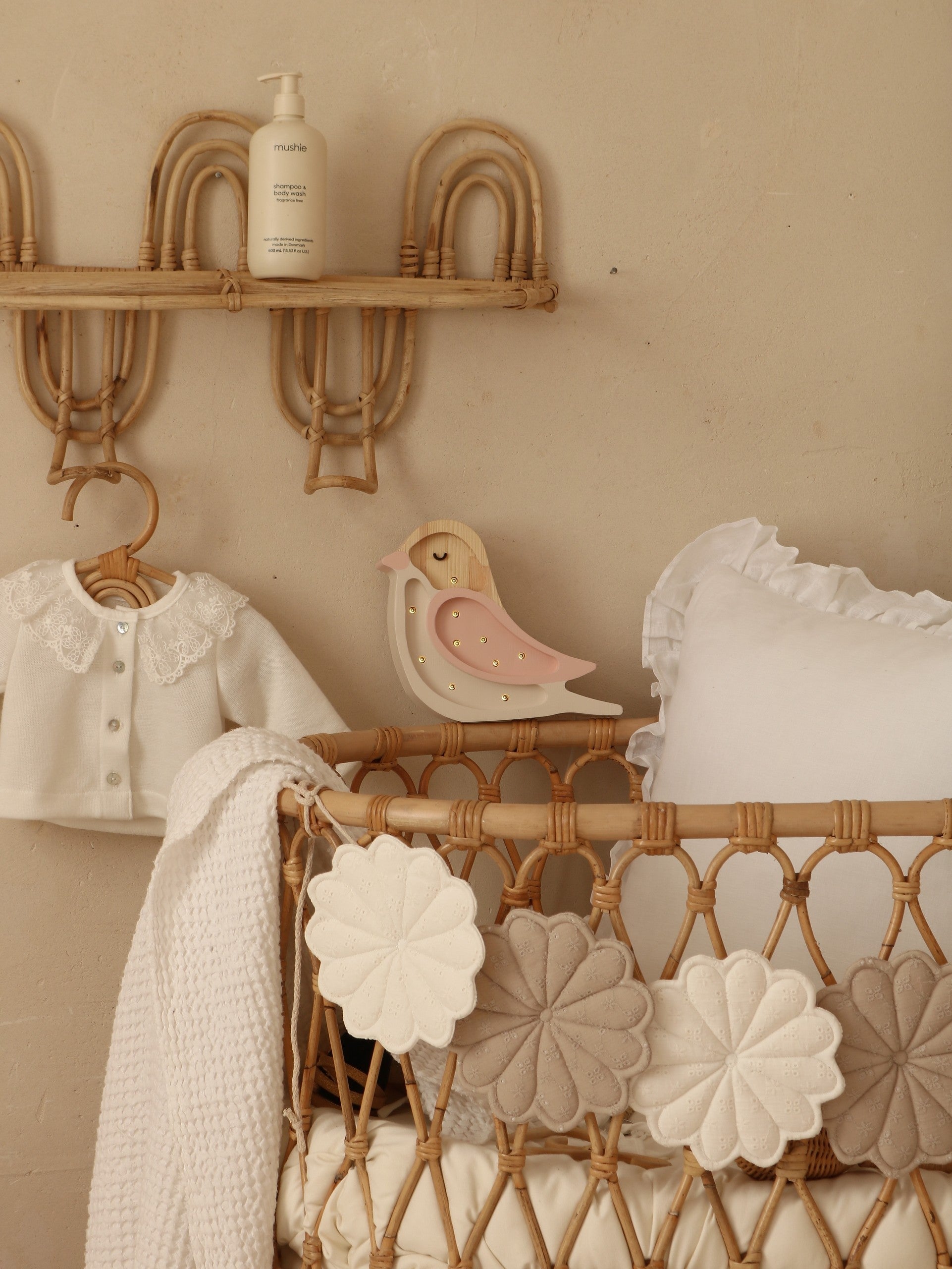 little lights bird mini lamp on a nightstand with cord and dimmer switch visible for easy use