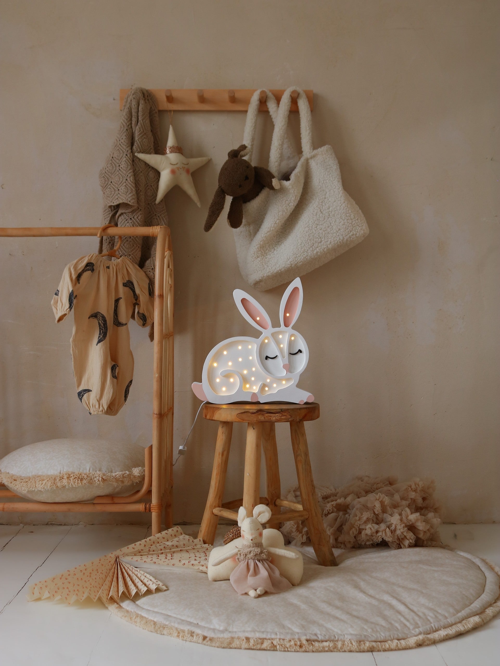 a functional pinewood bunny lamp with adjustable dimmer and timer for a childs bedtime