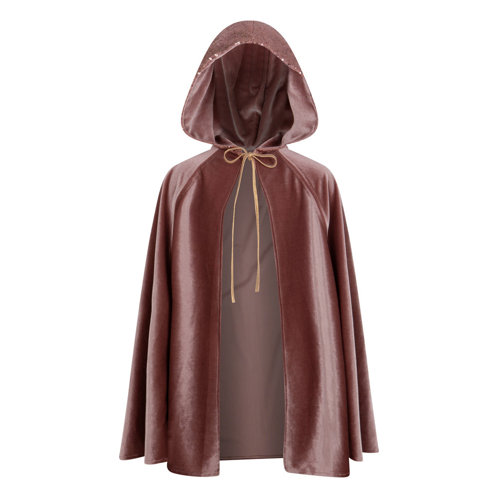 child in a cosmic pearl magic cape twirling with hands through the hand holes