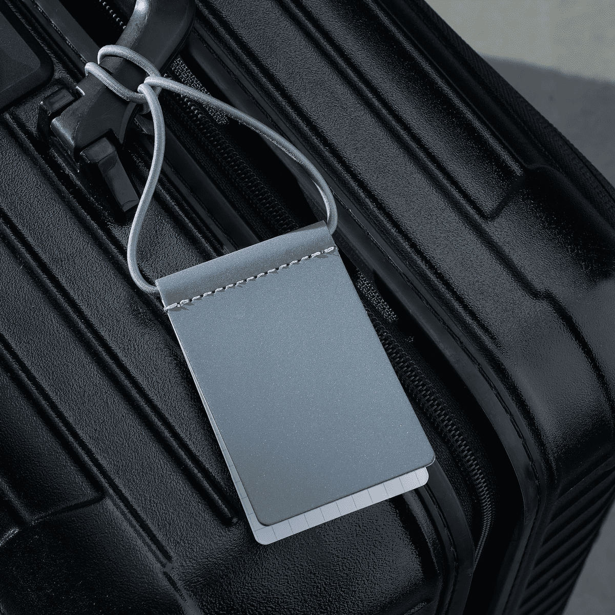 Reflective & Writable MARCH Luggage Tag – Stand Out Securely by March Design Studio at www.brixbailey.com