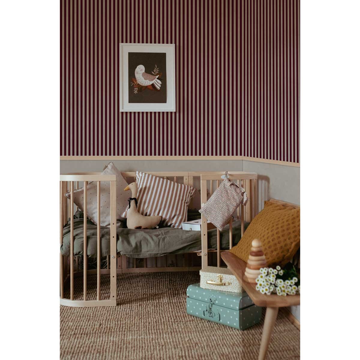 bold maya stripes wallpaper in warm brown and beige for a chic kids room