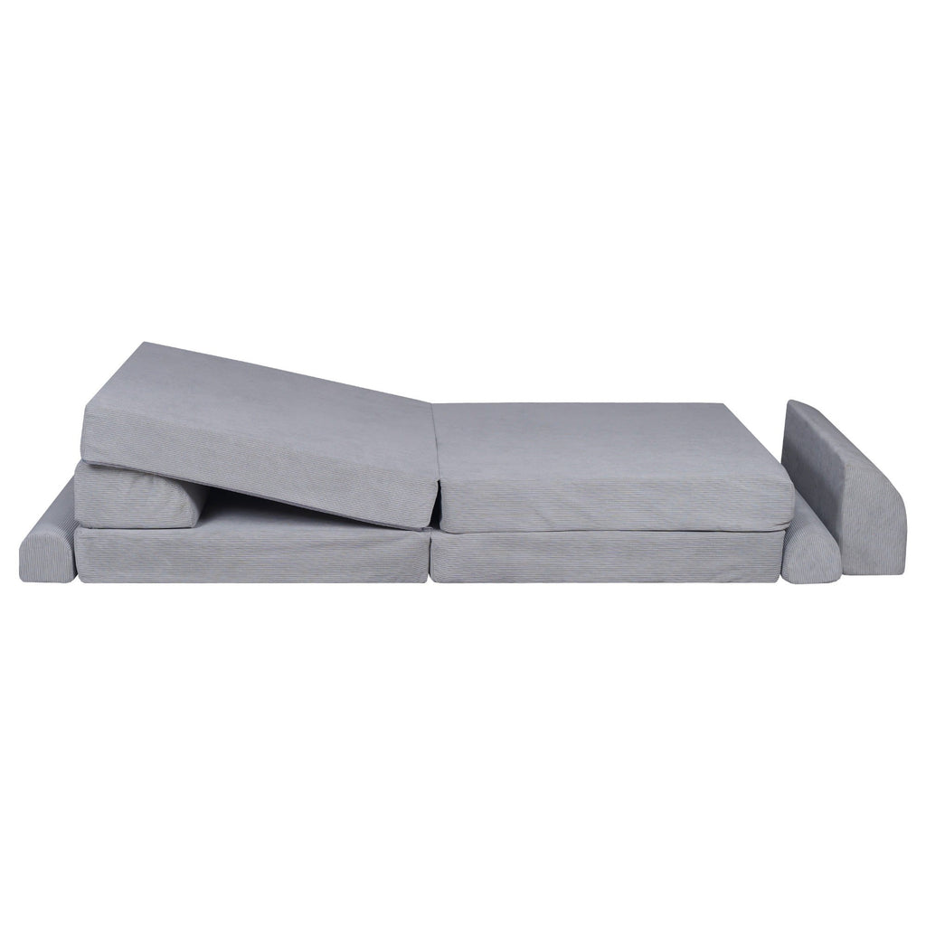 a soft gray corduroy kids sofa bed in a cozy, sunlit corner, ready for naptime