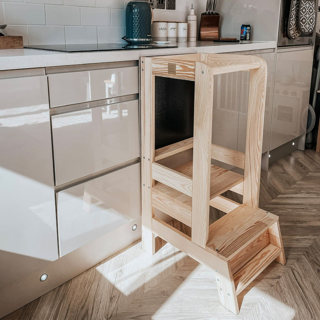 a gentle side view of the wooden kitchen helper in a cozy, sunlit home setting