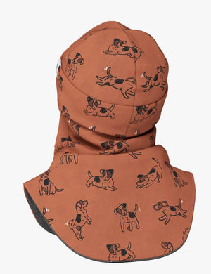 a child's copper dogs merino balaclava shown softly lit, highlighting its gentle warmth and cozy fit