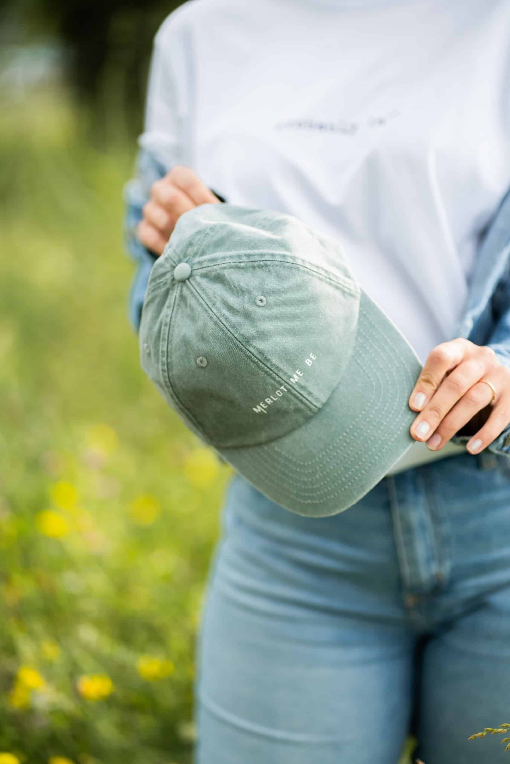 elegant merlot me be cotton cap with a soft, worn-in texture and brass buckle detail
