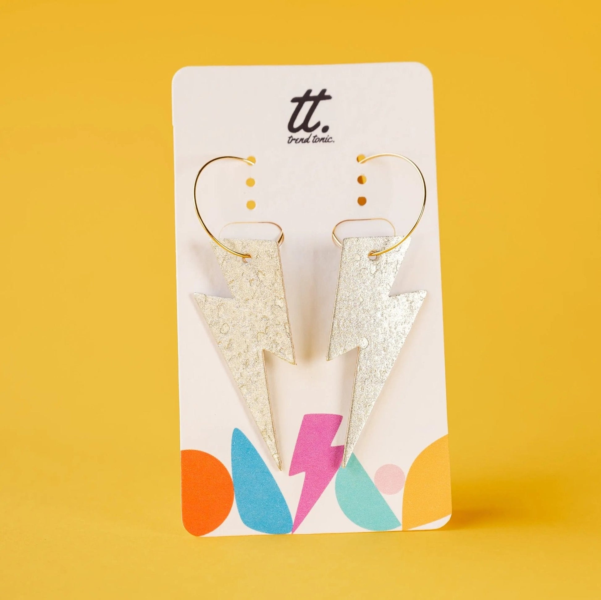 Metallic gold cork lightning bolt hoop earrings