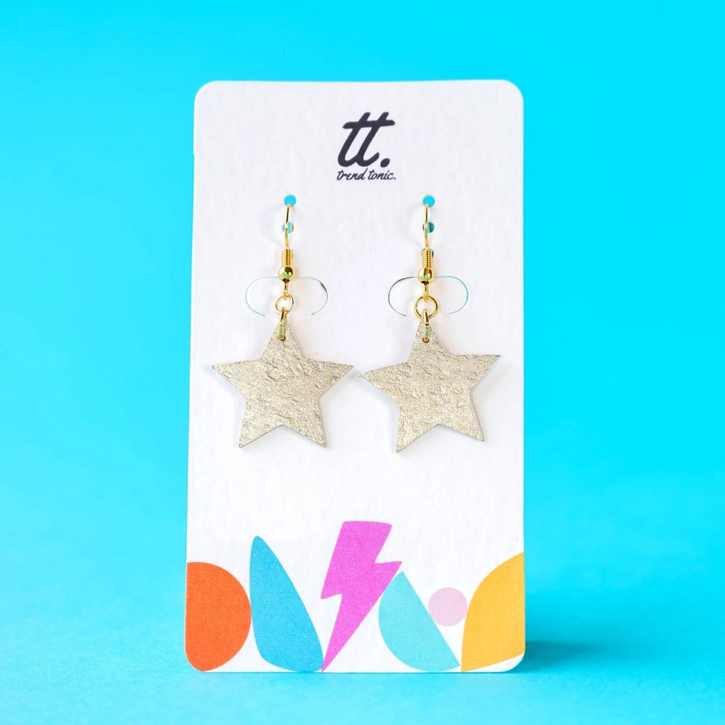 Mini gold star earrings