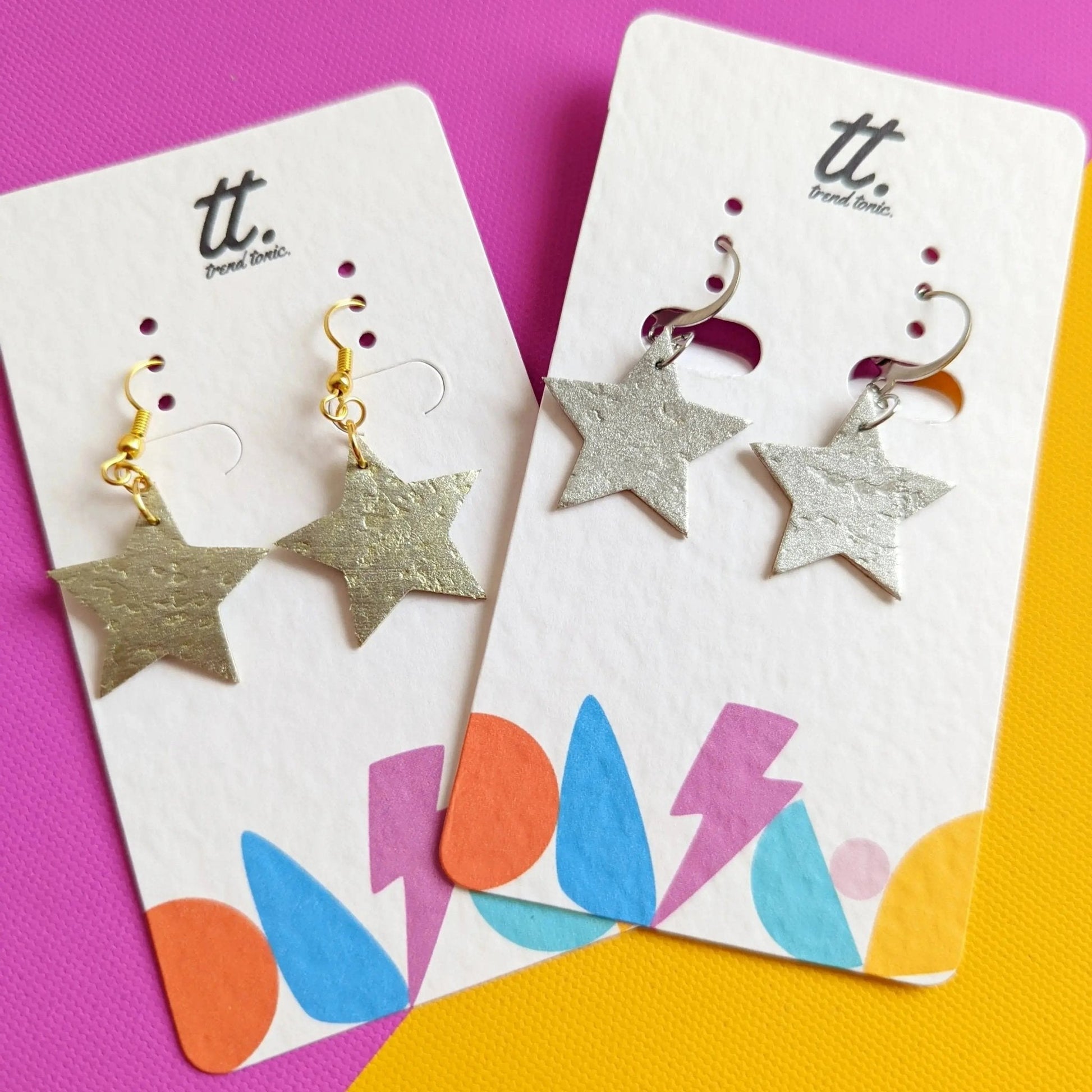 Mini gold star earrings