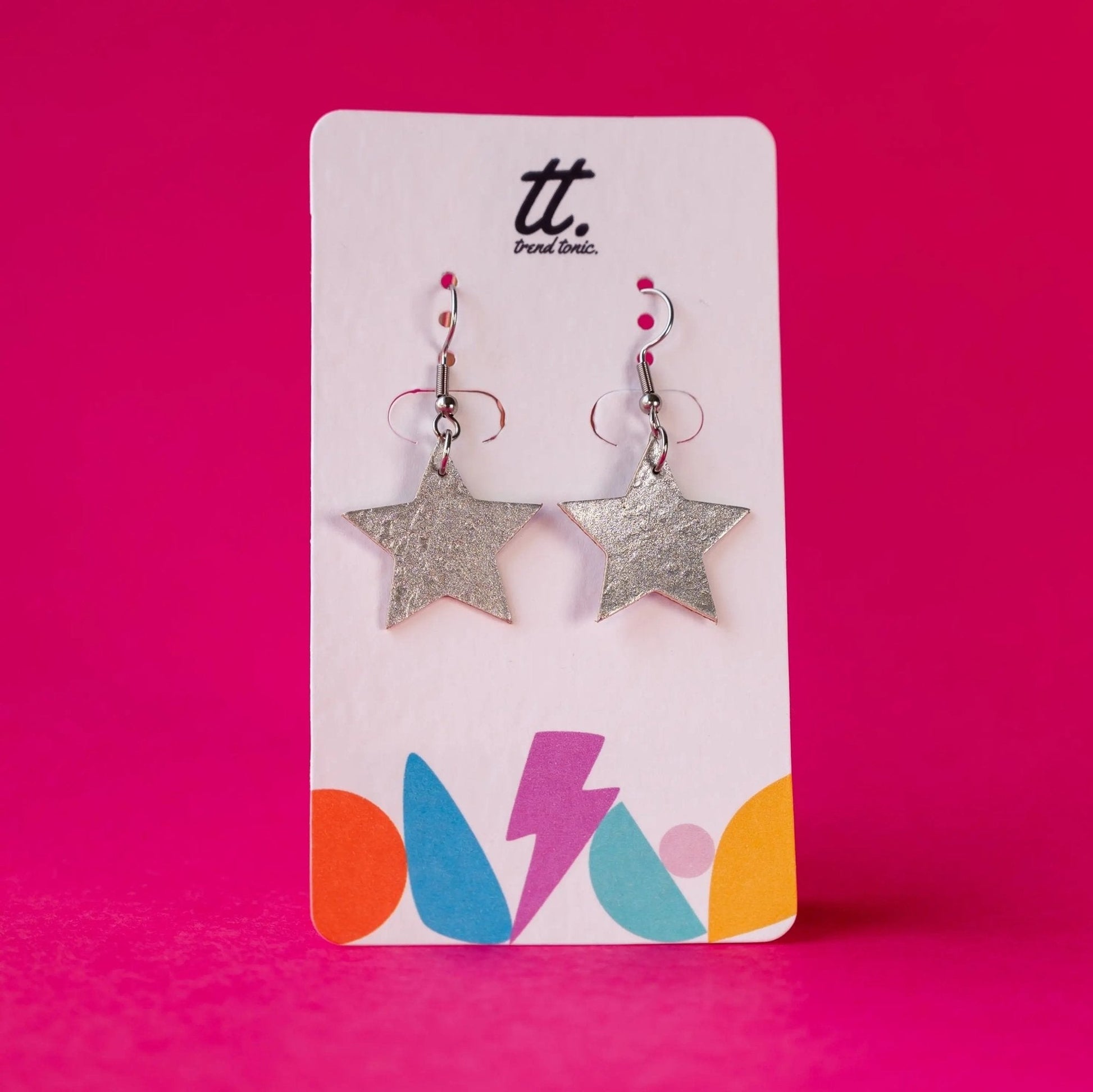 Mini silver star earrings