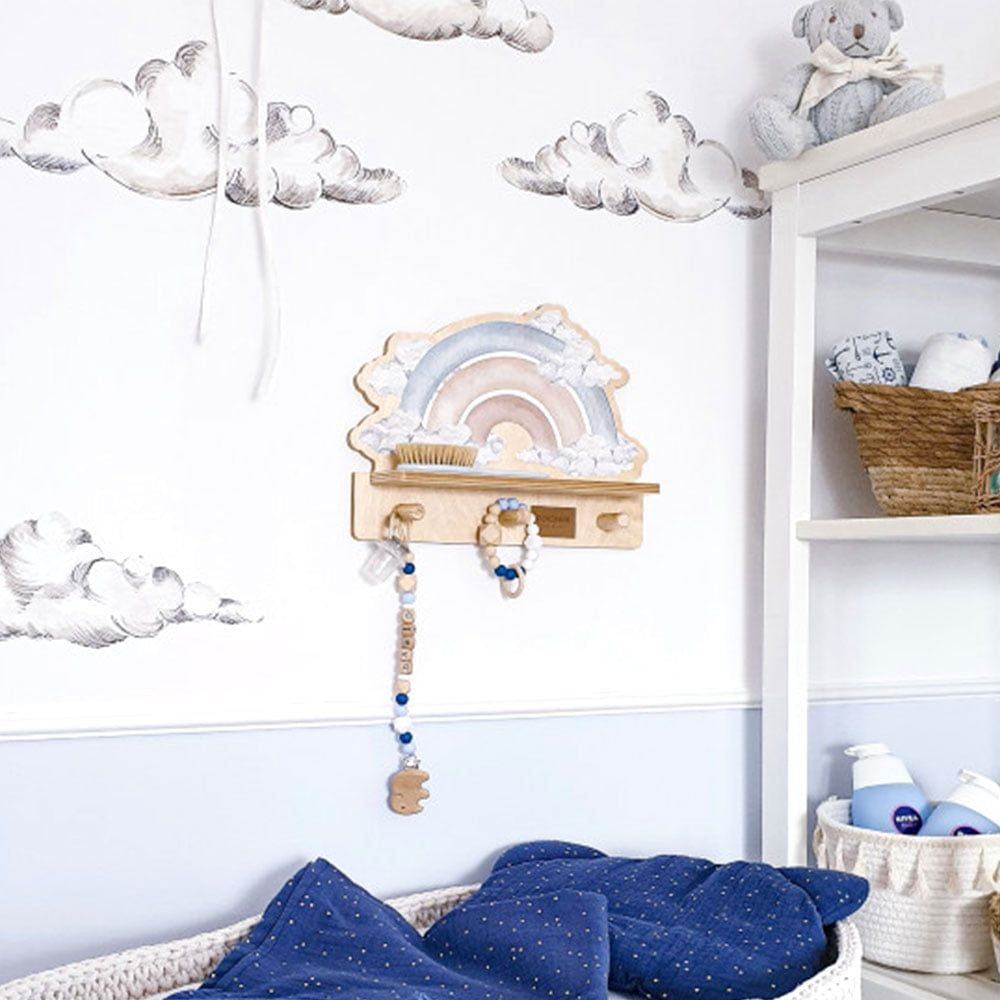 blue rainbow mini wall shelf with dinosaur sticker in a bright, playful kids room setting
