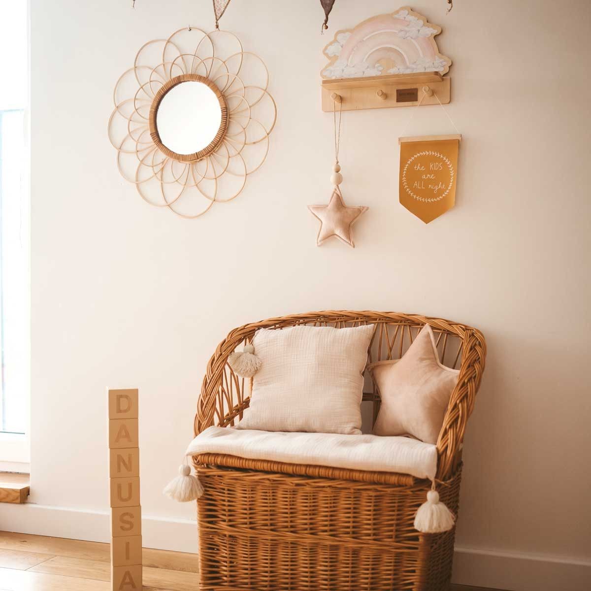 elegant pink rainbow shelf with a dinosaur print displayed in soft natural light